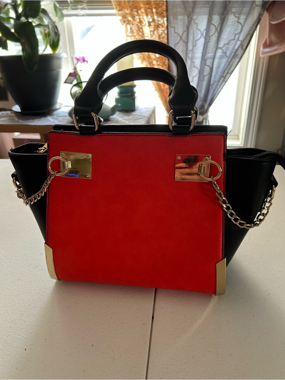 Two-Tone Red and Black Top-Handle Satchel with Chain Detail